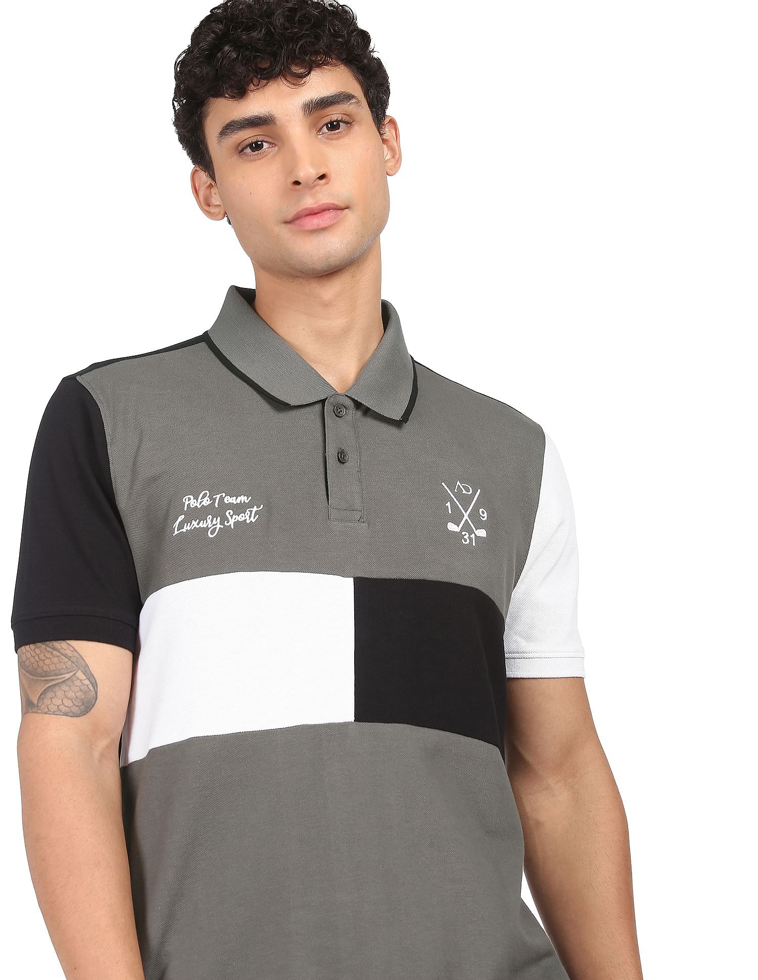 Buy AD by Arvind Men Navy And Yellow Cotton Colour Block Logo Polo Shirt -  NNNOW.com