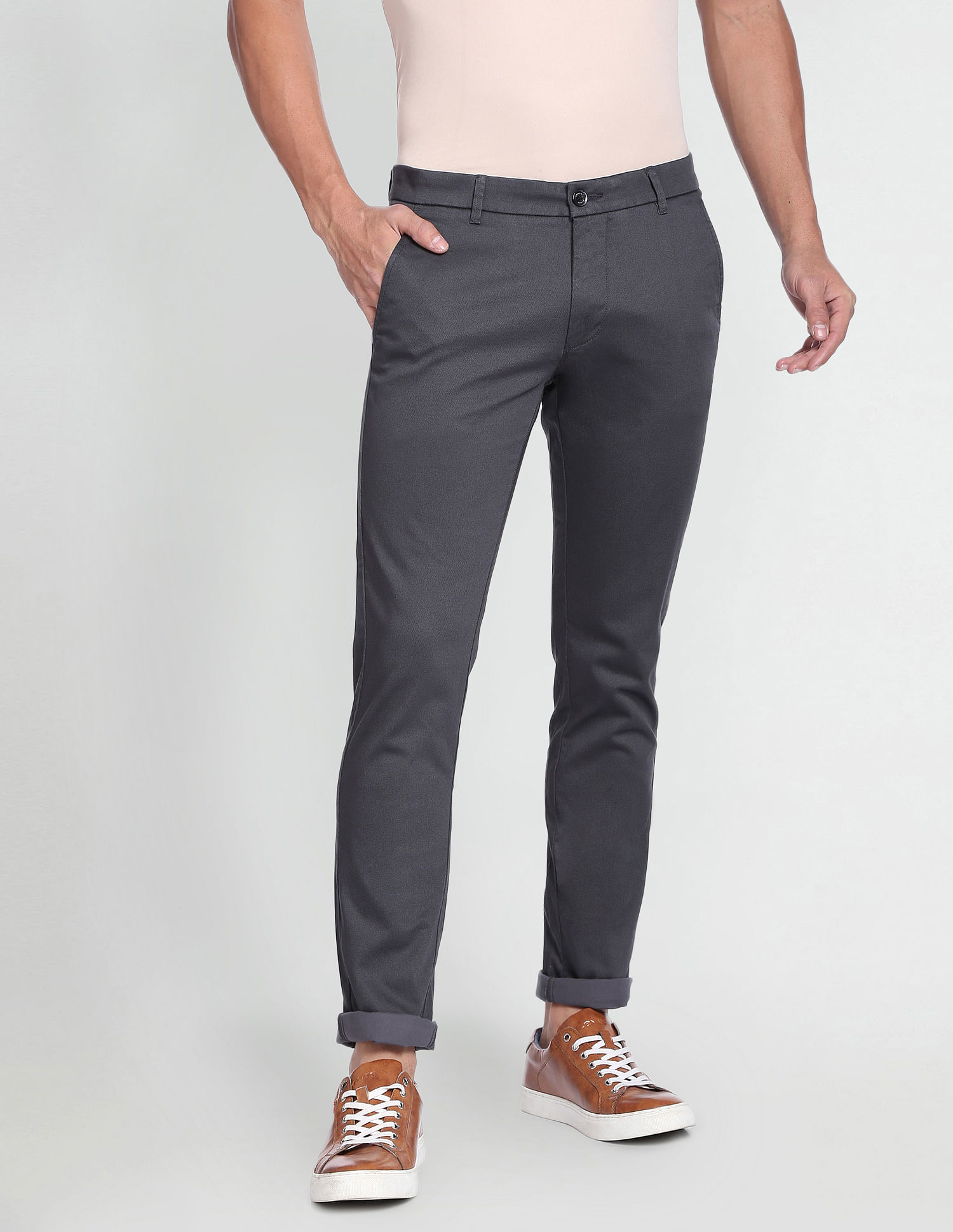 Buy Arrow Sports Low Rise Jackson Skinny Fit Solid Trousers - NNNOW.com