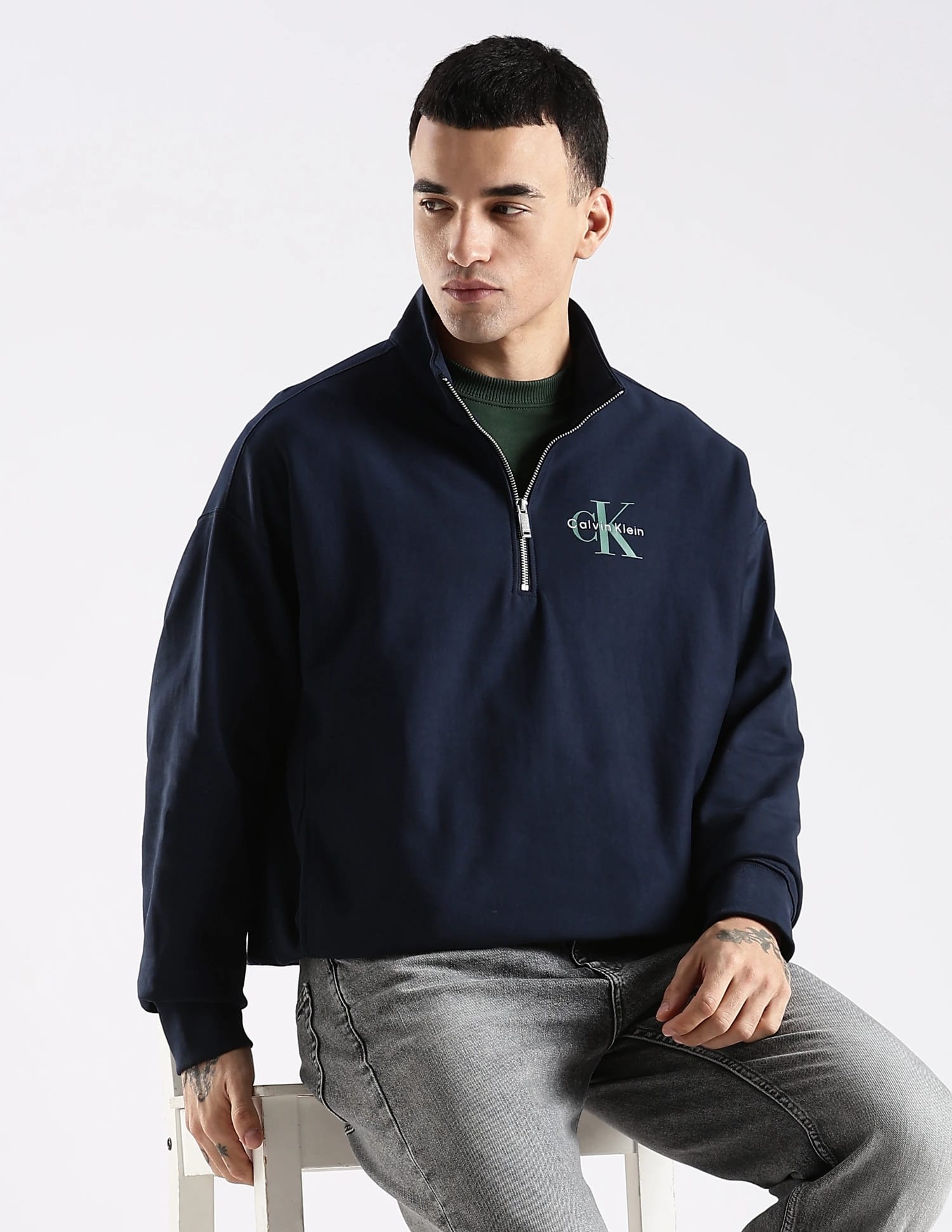 Buy Calvin Klein Jeans Solid Oversized Fit Cotton Sweatshirt - Main Image