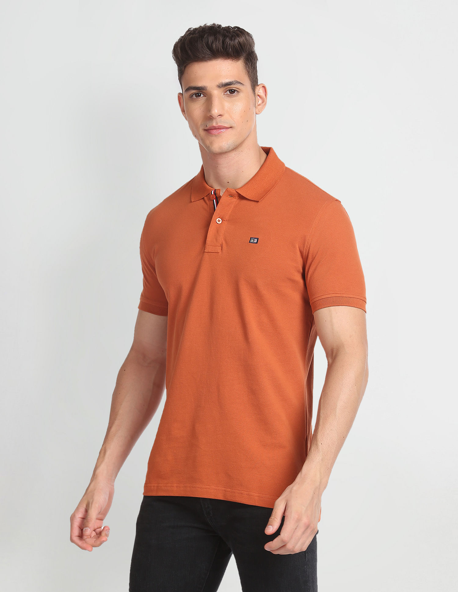 Arrow Sports Ribbed Collar Solid Polo Shirt
