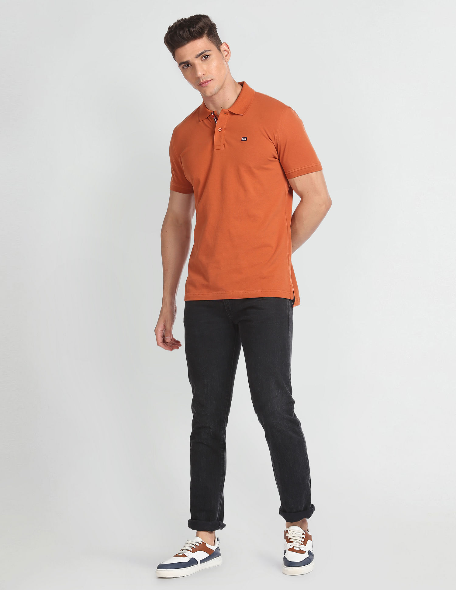 Arrow Sports Ribbed Collar Solid Polo Shirt