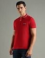 Tommy Hilfiger Solid Regular Fit Cotton Polo T-Shirt