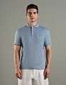 Tommy Hilfiger Solid Slim Fit Cotton Polo T-Shirt