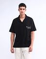 Flying Machine Typography Printed Relaxed Polo Shirt