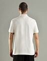 Tommy Hilfiger Solid Regular Fit Cotton Polo T-Shirt